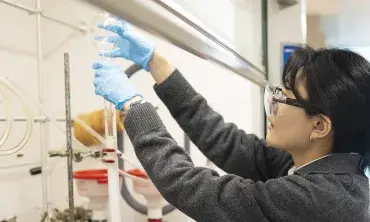 Student conducting research in a chemistry lab