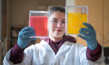 A student showing off some aerogels.