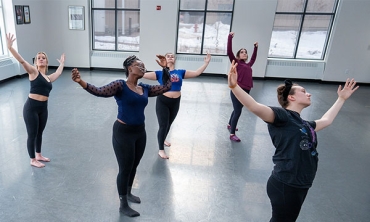 Dancer practice their moves in the Henle Dance Studio