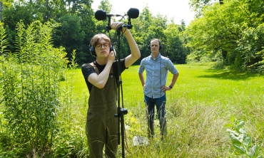 Aspen Morris ’25 and Christopher Chandler, assistant professor of music, capture the sound of birds and the environment in Jackson's Garden. 