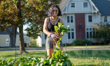 A student gardening in the Octopus's Garden