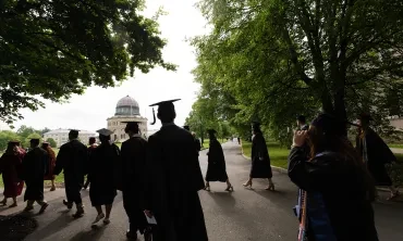 Graduates in front of the Nott Memorial 