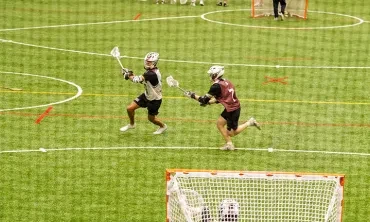 Students playing on the turf field