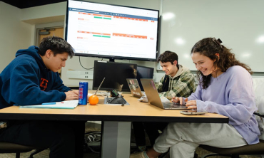 Students Francesco Ciaramitaro '28&nbsp;, Chris Wearing '26 and Lu De Azevedo ‘27 compete in a recent Microsoft Excel Collegiate Challenge from the Peter Irving Wold Center.