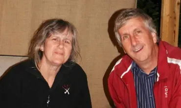 Steven Schmidt, the Kenneth B. Sharpe Professor of Economics, and his wife, Alexandra, in their sukkah.
