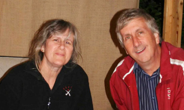 Steven Schmidt, the Kenneth B. Sharpe Professor of Economics, and his wife, Alexandra, in their sukkah.