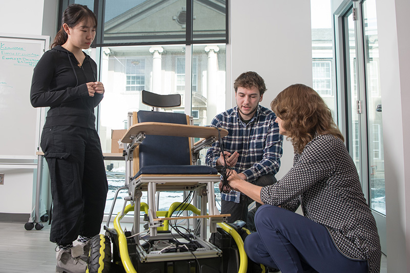 Engineering students Yueyin Su and Benjamin Davis collaborated with Professir Traver on the replicable power wheelchair.