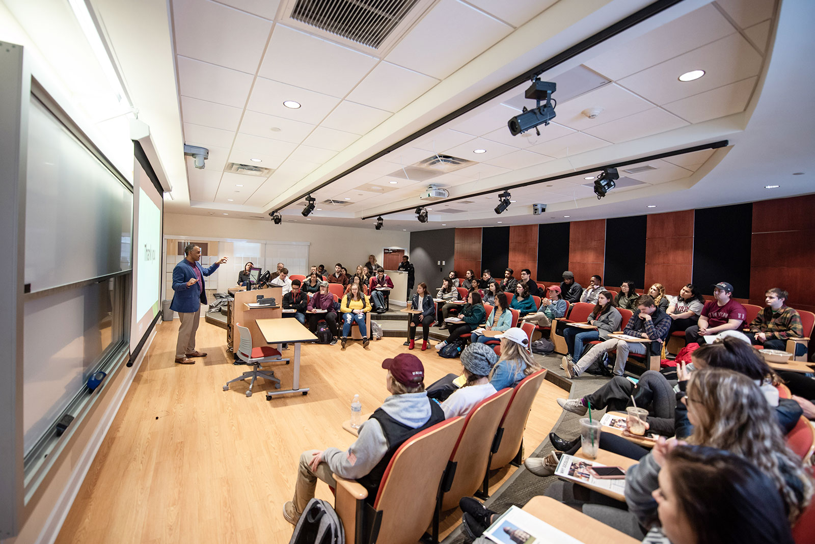 The Union College president lectures on sociology before an audience of students assembled in the electronic classroom.